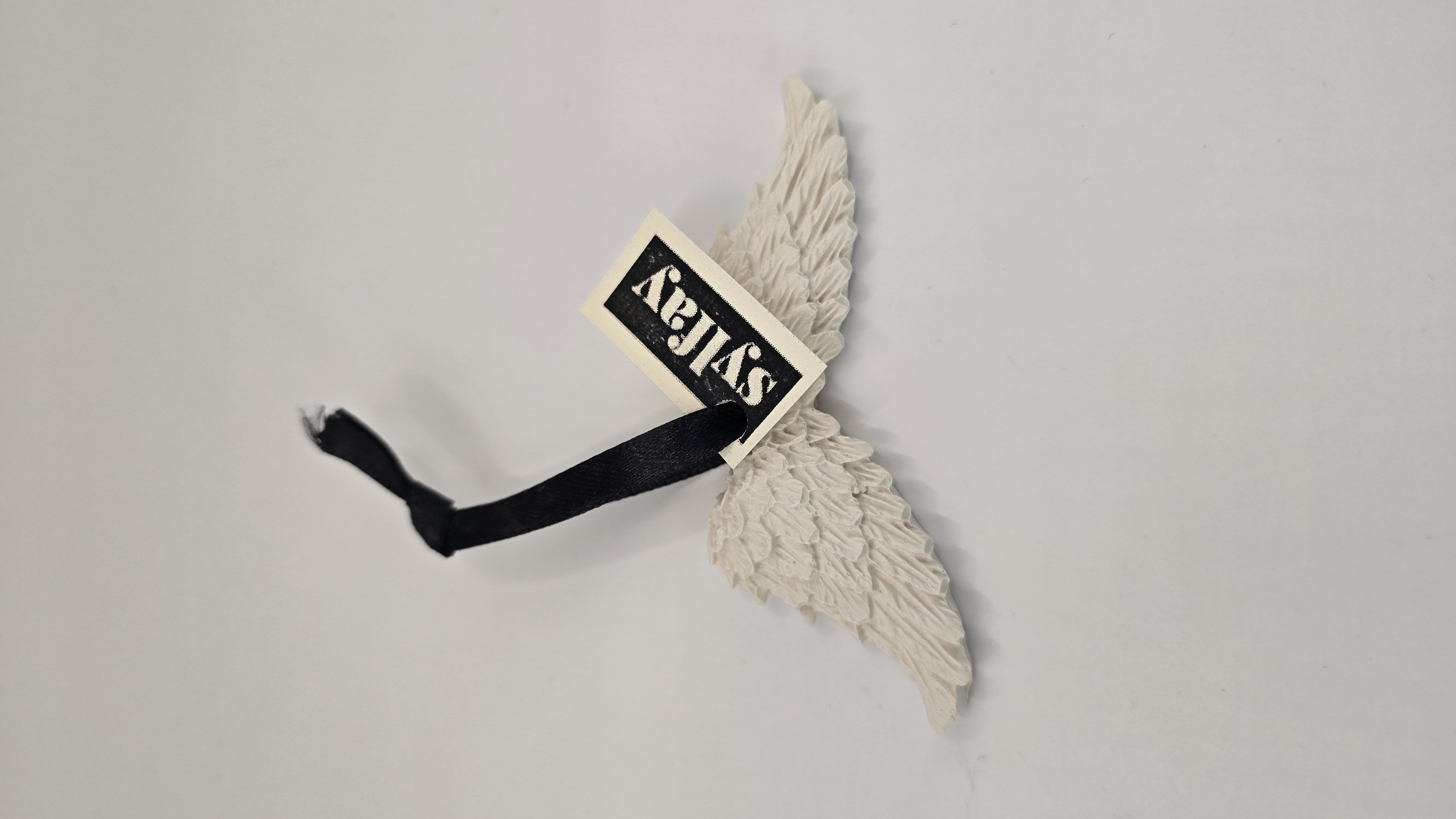 Médaillon ailes d'ange – détail